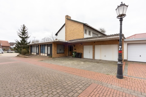 Lifestyle und Business: Attraktive Immobilie mit Gewer­be­einheit in Hagen am Teuto­burger Wald, 49170 Hagen am Teutoburger Wald, Haus